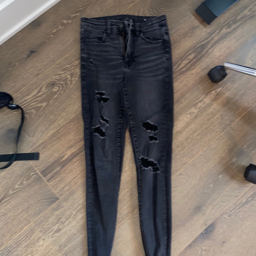 Black skinny jeans with holes